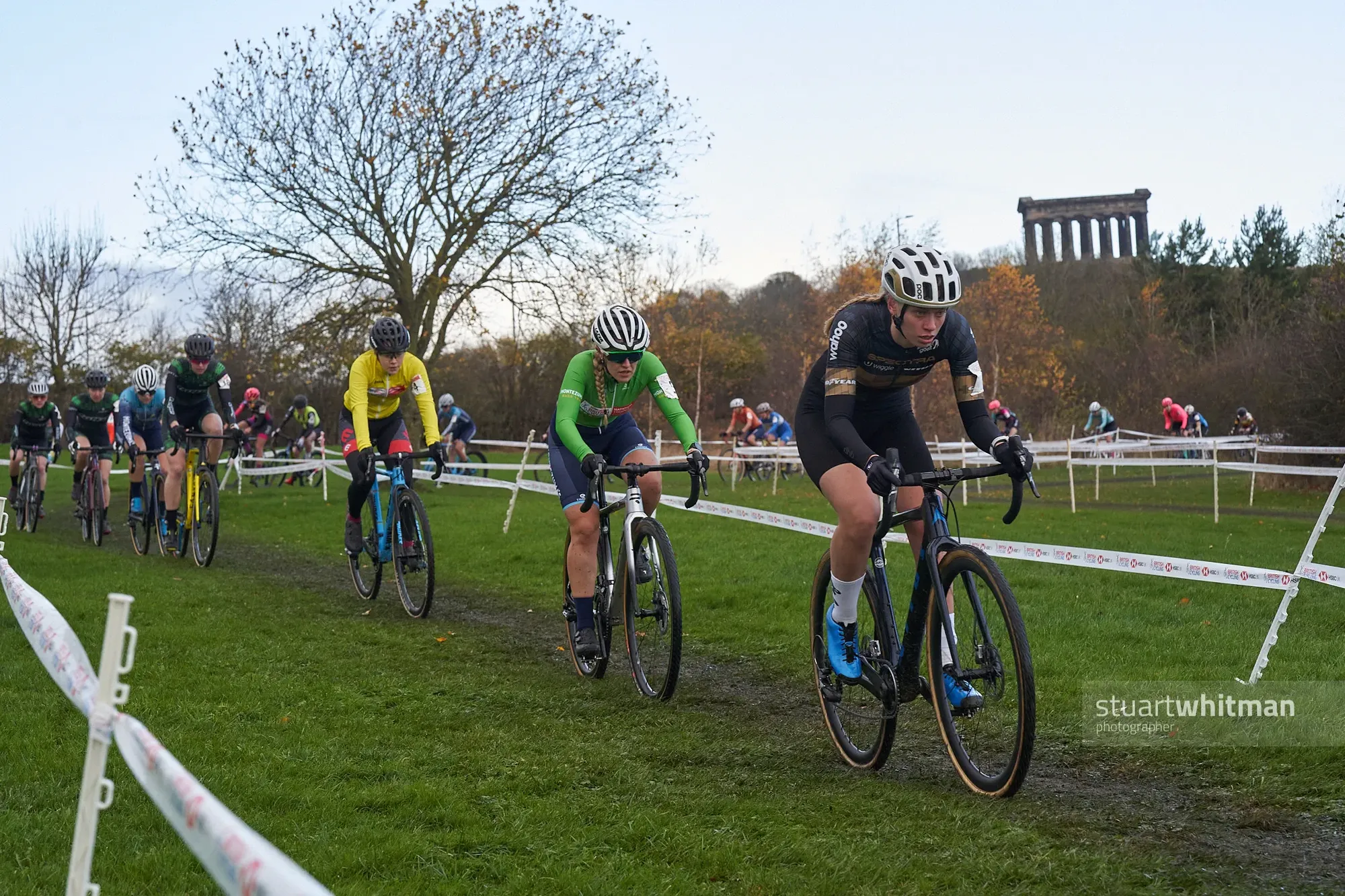 Amira Mellor, Spectra Wiggle p/b Vitus leads the elite women on the opening lap at Herrington Park with Penshaw monument in the distance.